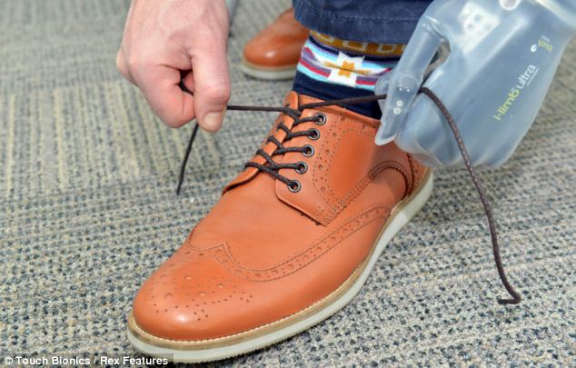 Prosthetic hand easily grips shoe lace